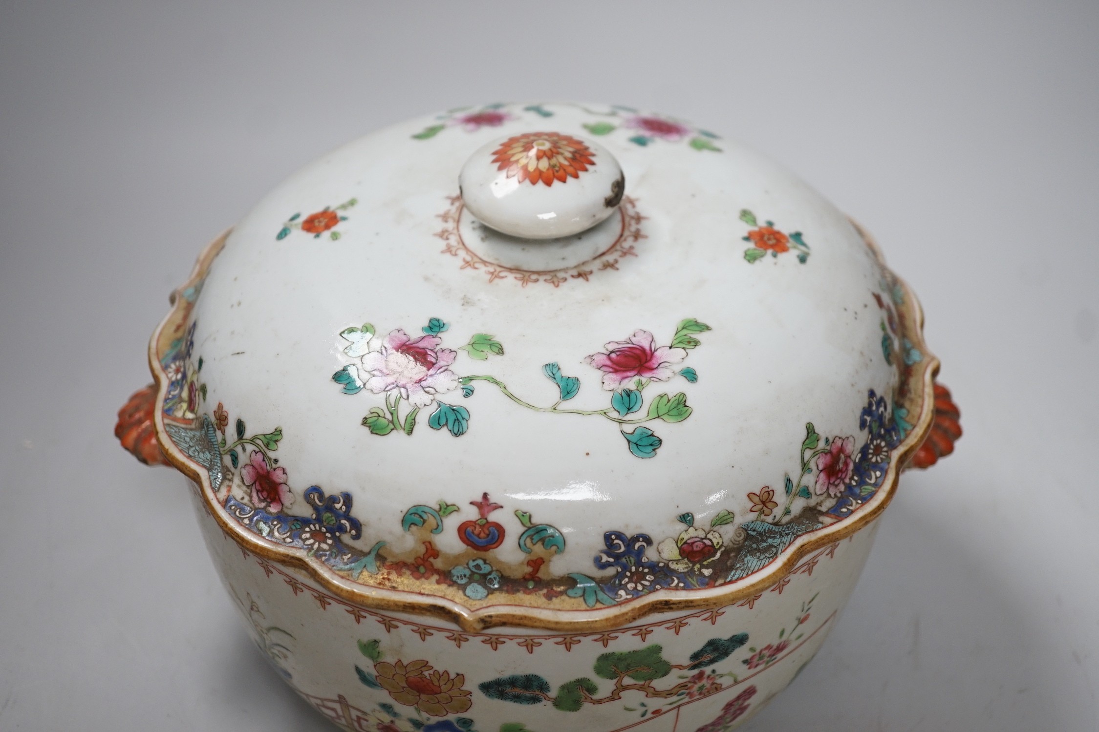 A Chinese famille rose ‘garden’ tureen and cover, Qianlong period, 19cms high